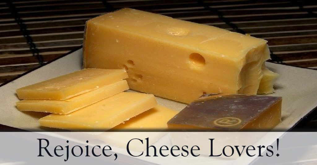 Rejoice, Cheese Lovers! Sliced cheese on a table.